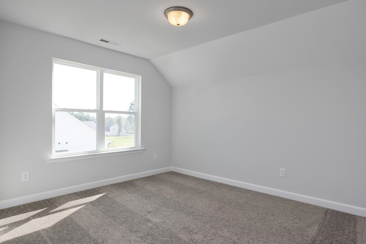 82 Morningside Lane Angier, NC 27501 - Photo 26 of 28 an empty room with a window