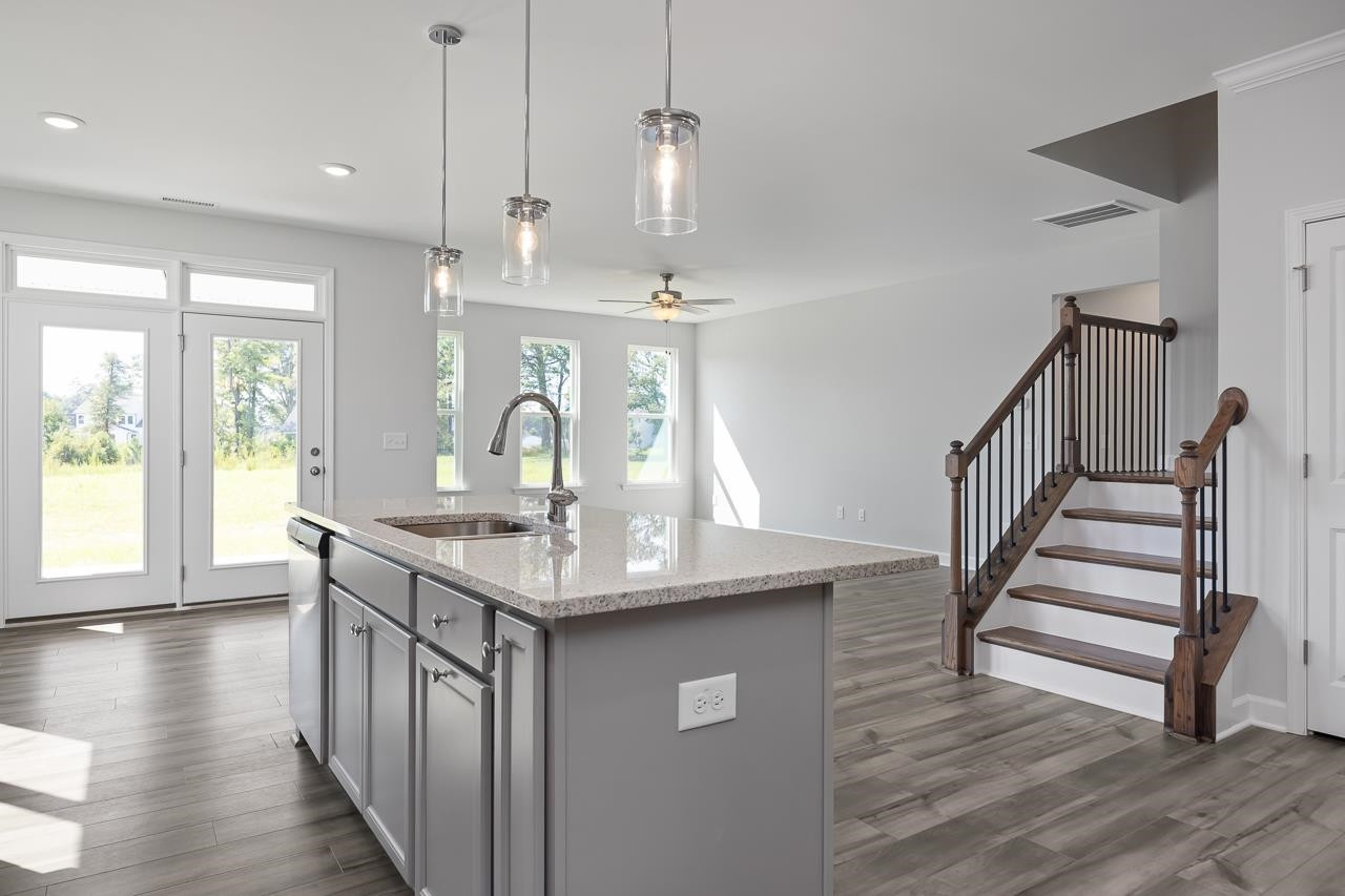 82 Morningside Lane Angier, NC 27501 - Photo 10 of 28 a kitchen with sink and stove