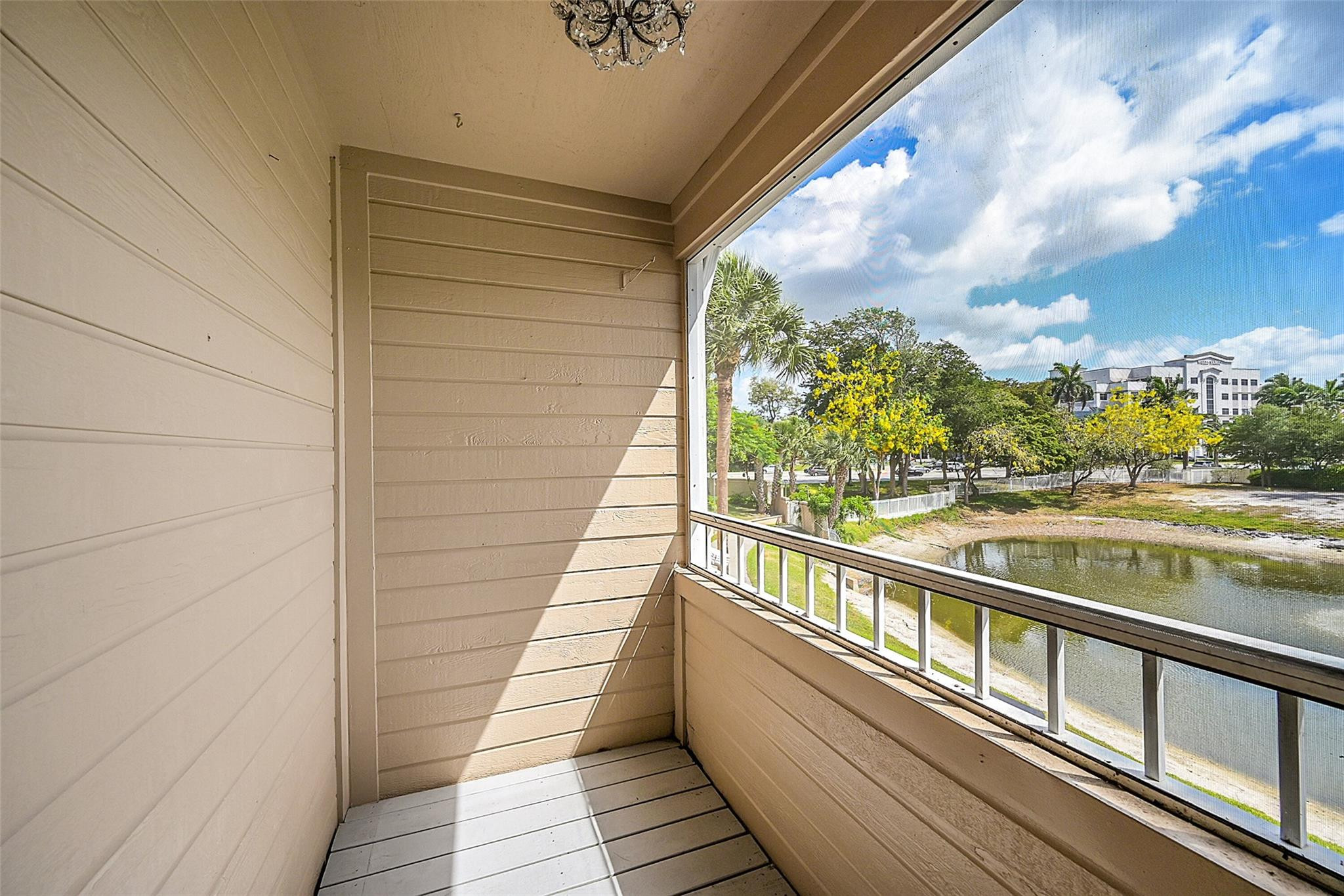 5307 Buckhead Circle, Unit 203 Boca Raton, FL 33431 - Photo 27 of 34 Living room balcony