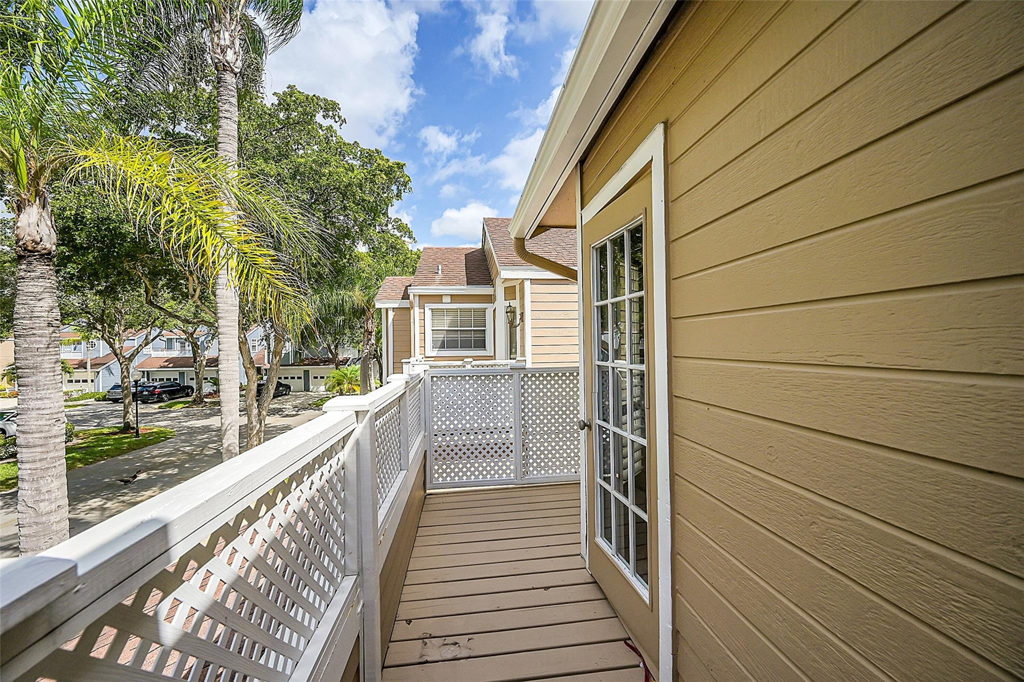 5307 Buckhead Circle, Unit 203 Boca Raton, FL 33431 - Photo 29 of 34 Kitchen balcony