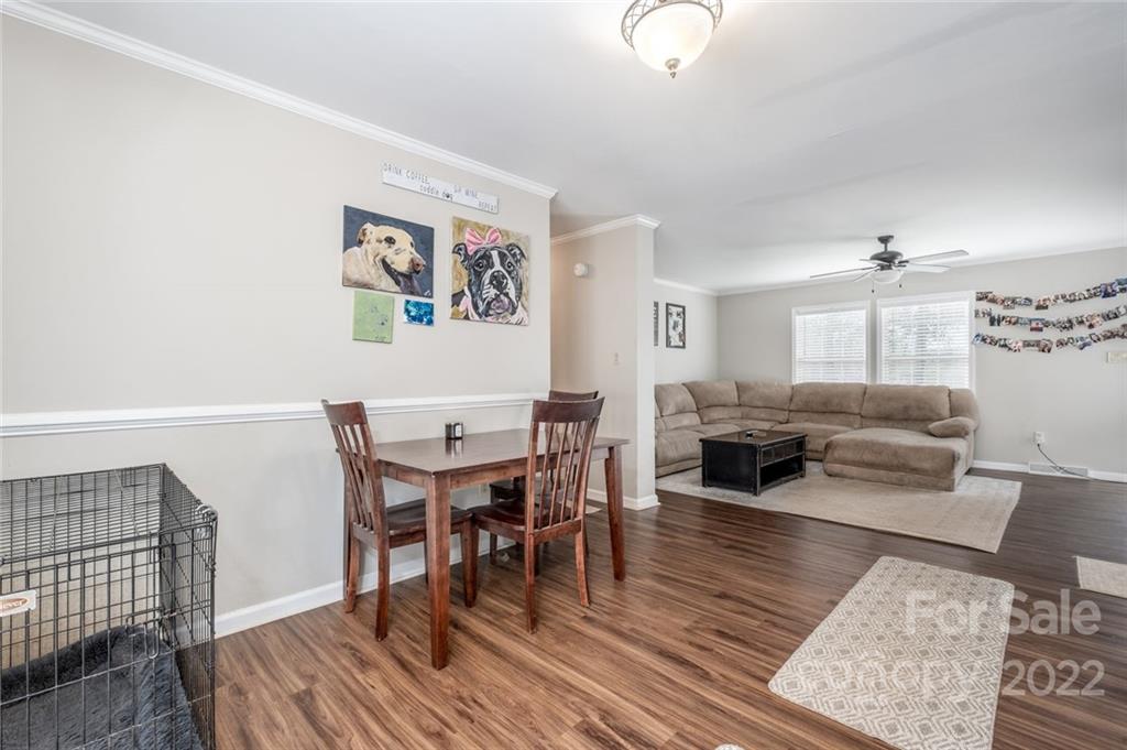 3914 Kiser Island Road Terrell, NC 28682 - Photo 7 of 21 a living room with furniture wooden floor and dining table