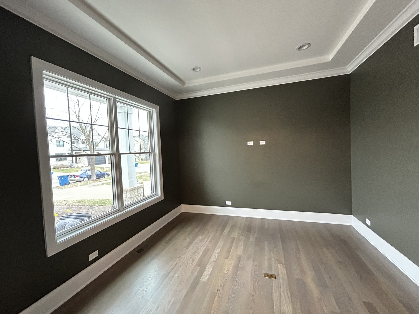 769 South Fairview Avenue Elmhurst, IL 60126 - Photo 10 of 22 a view of an empty room with wooden floor and a window