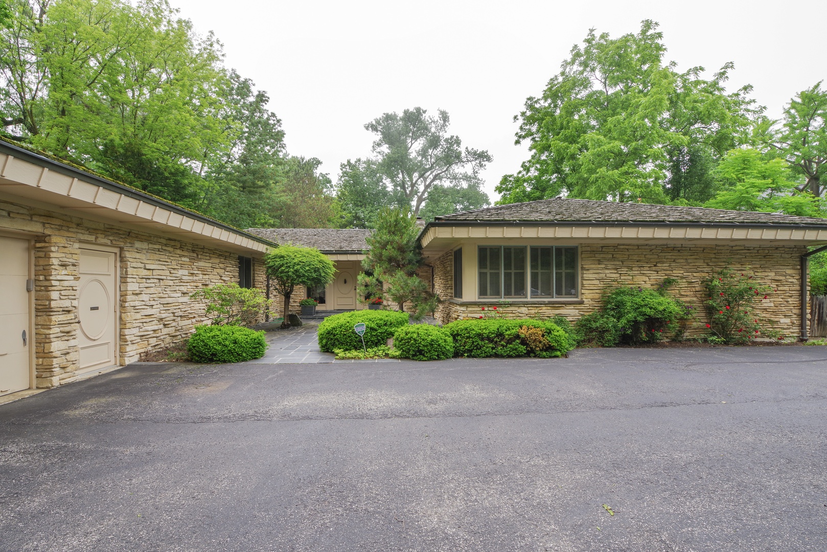 front view of a house and a yard