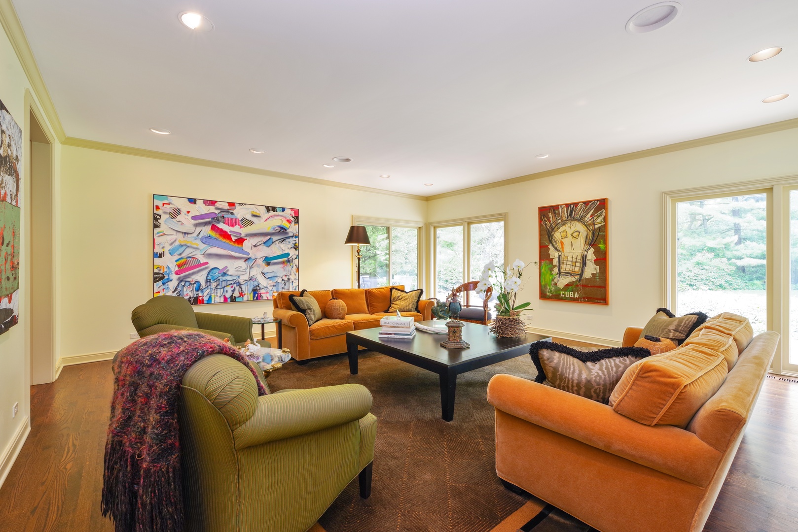 129 Beach Road Glencoe, IL 60022 - Photo 2 of 10 a living room with furniture a couch and a flat screen tv