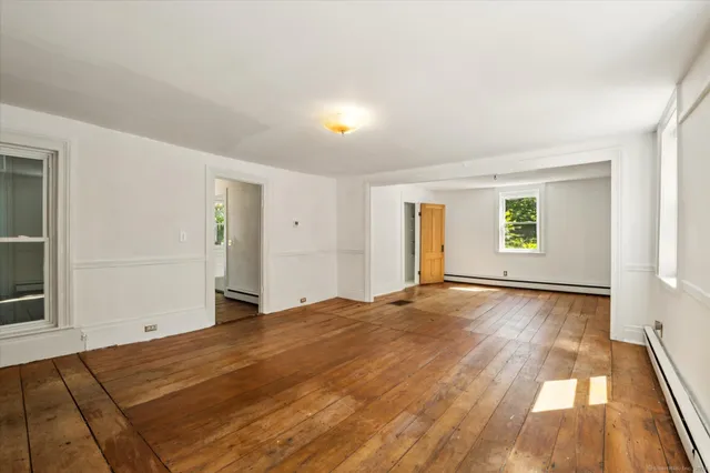 a view of an empty room and window