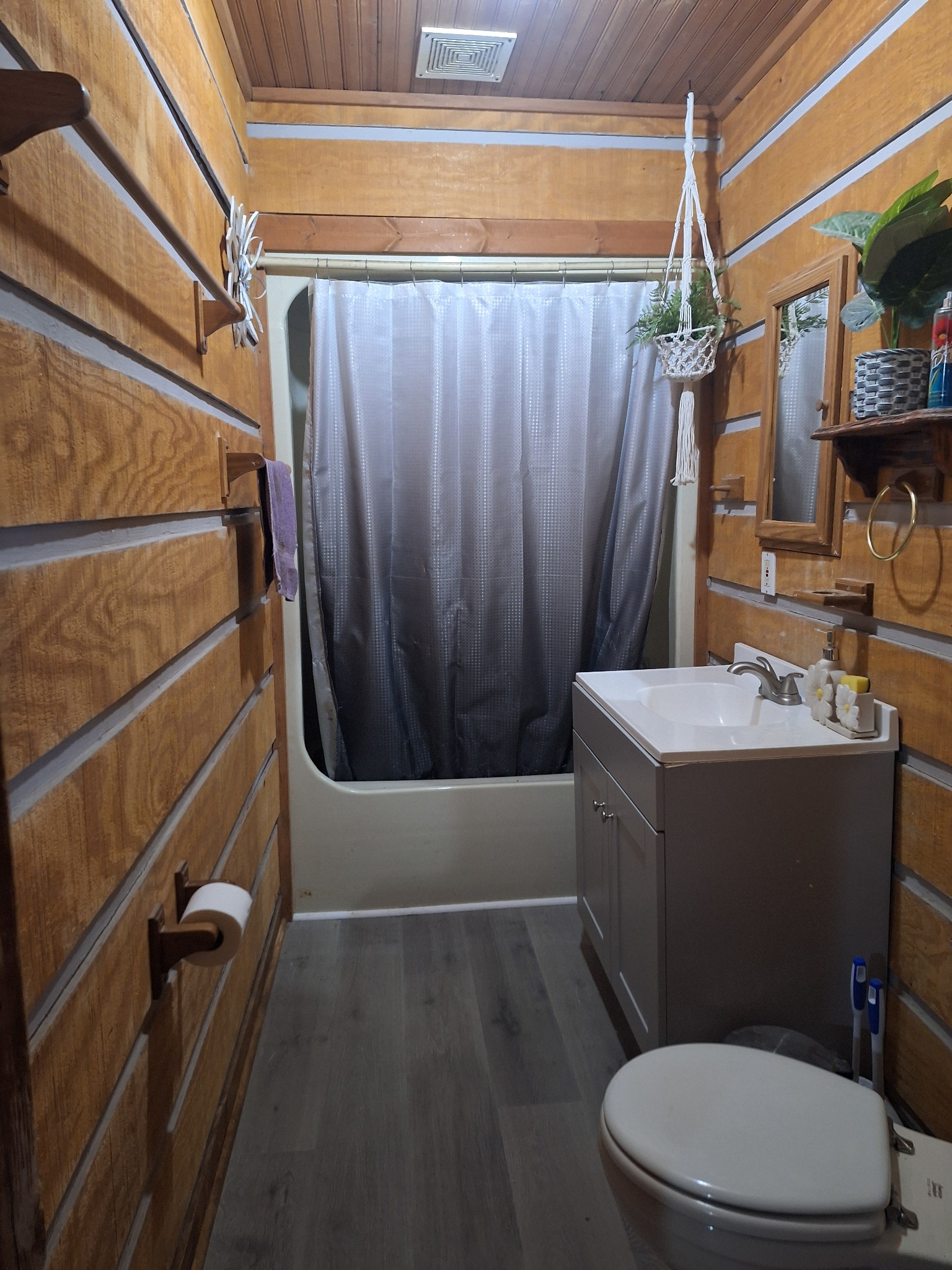 199 Dixon Ln. Waynesboro, TN 38485 - Photo 16 of 52 a bathroom with a sink a toilet and shower