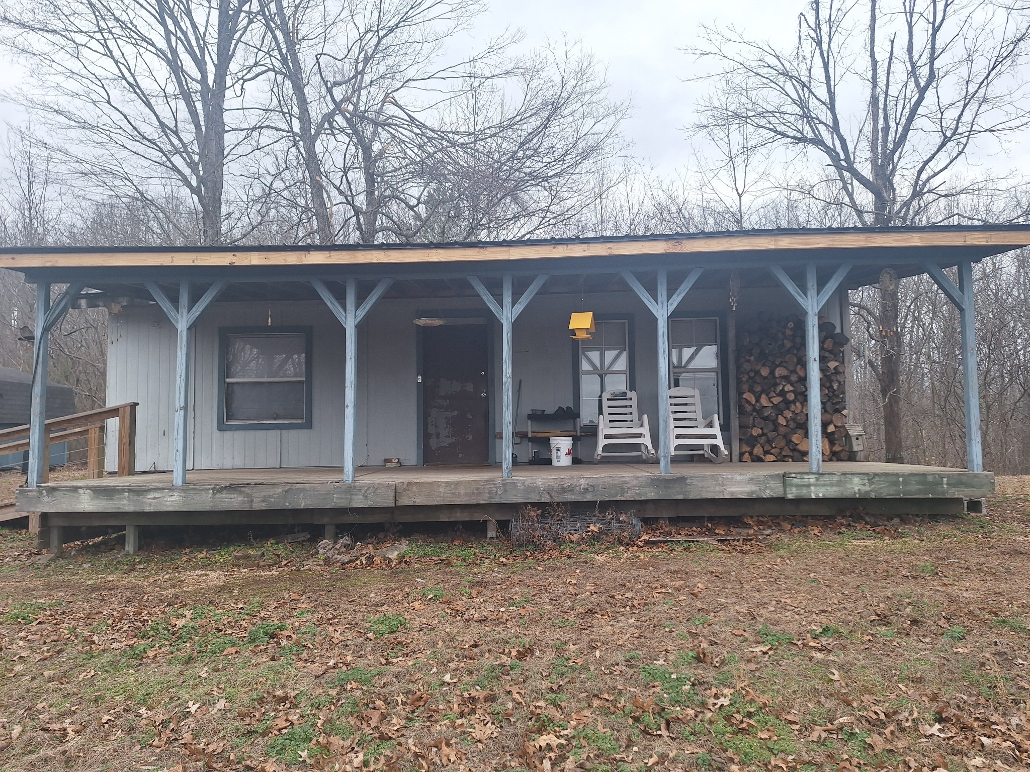 199 Dixon Ln. Waynesboro, TN 38485 - Photo 28 of 52 a front view of a house with garden
