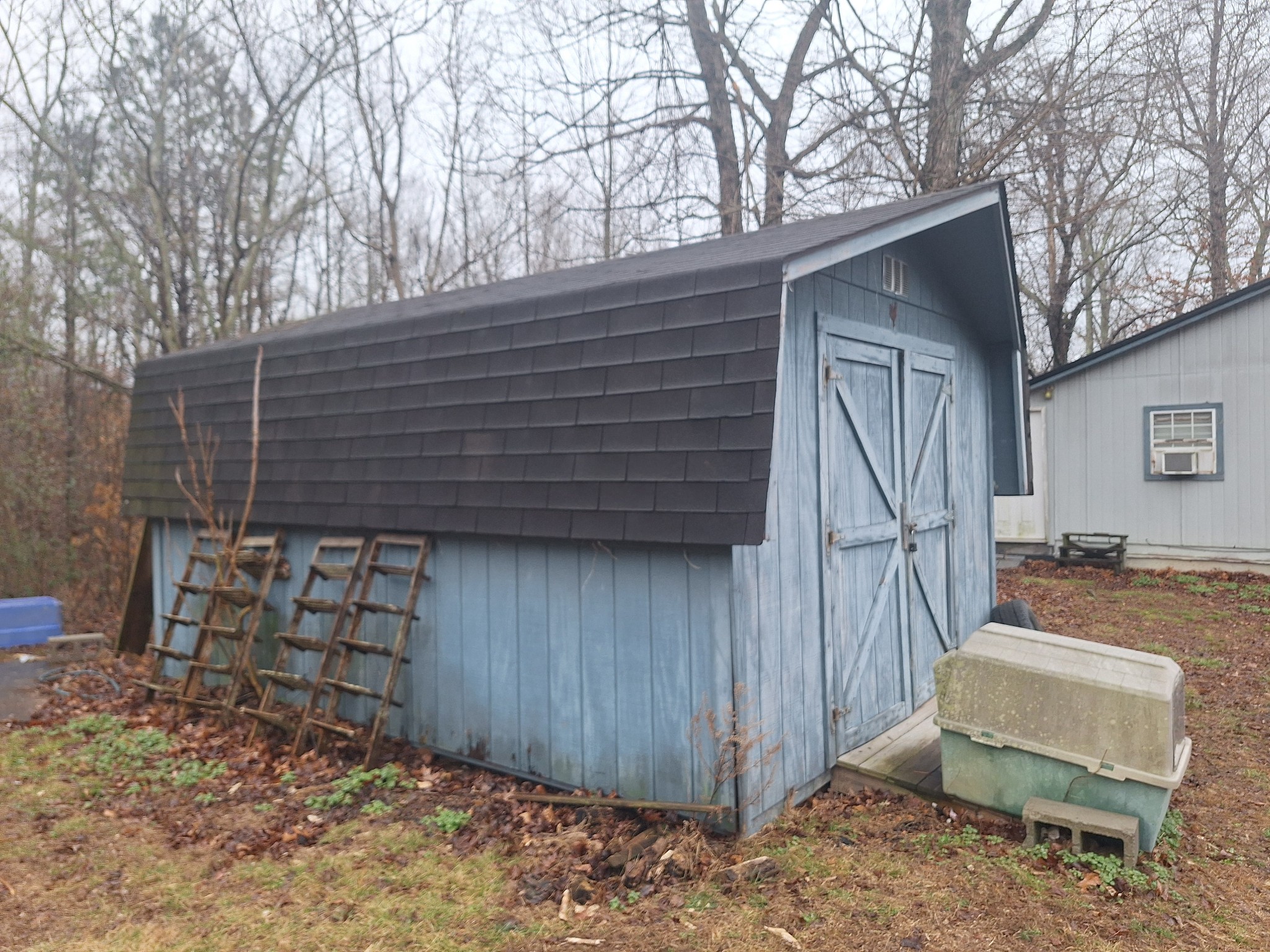 199 Dixon Ln. Waynesboro, TN 38485 - Photo 33 of 52 a view of a house with backyard and wooden fence