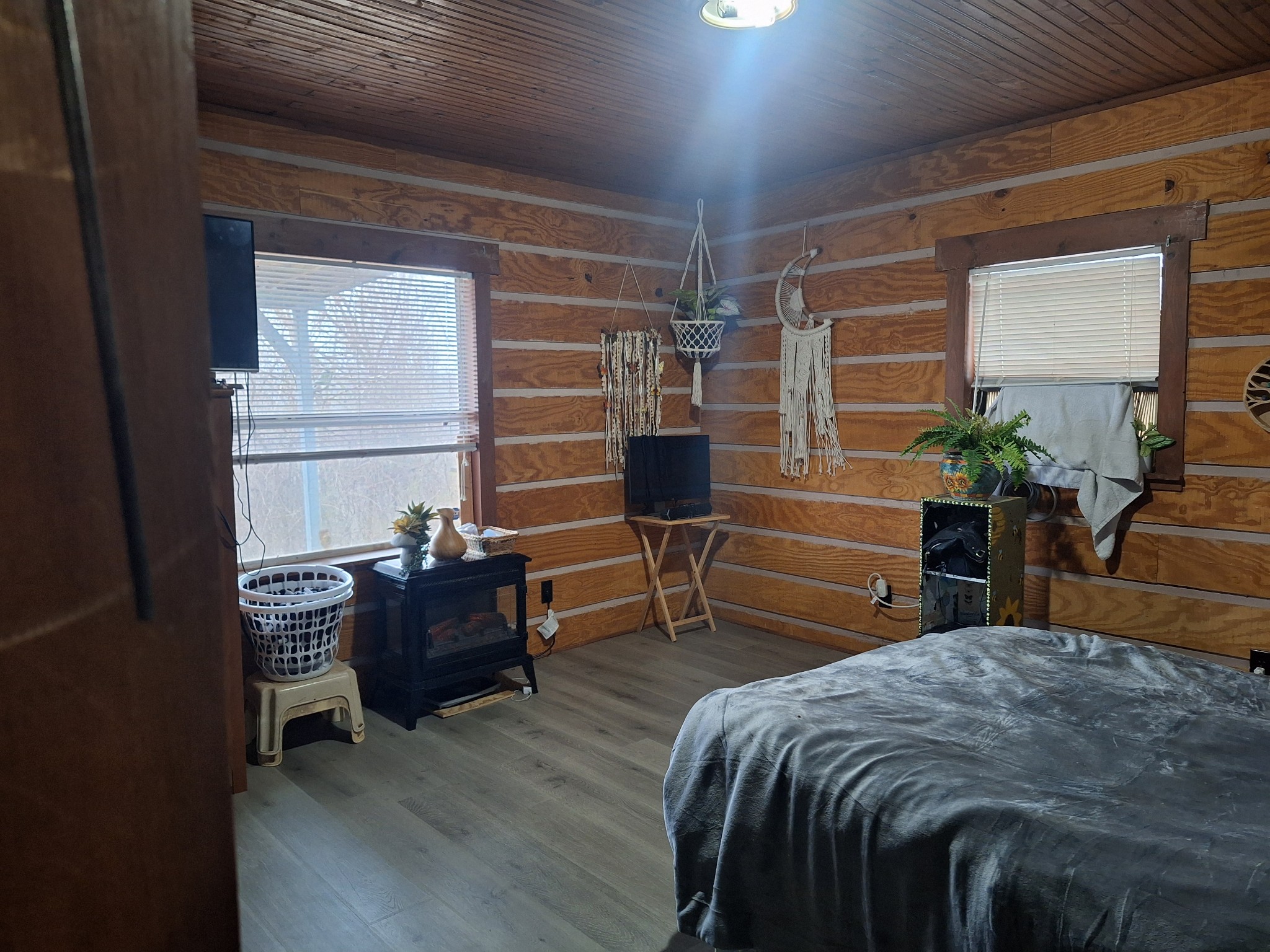199 Dixon Ln. Waynesboro, TN 38485 - Photo 9 of 52 a bedroom with a bed and wooden floor