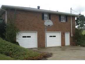 556 Opie Arnold Road Limestone, TN 37681 - Photo 5 of 23 2 Car Drive Under with Door