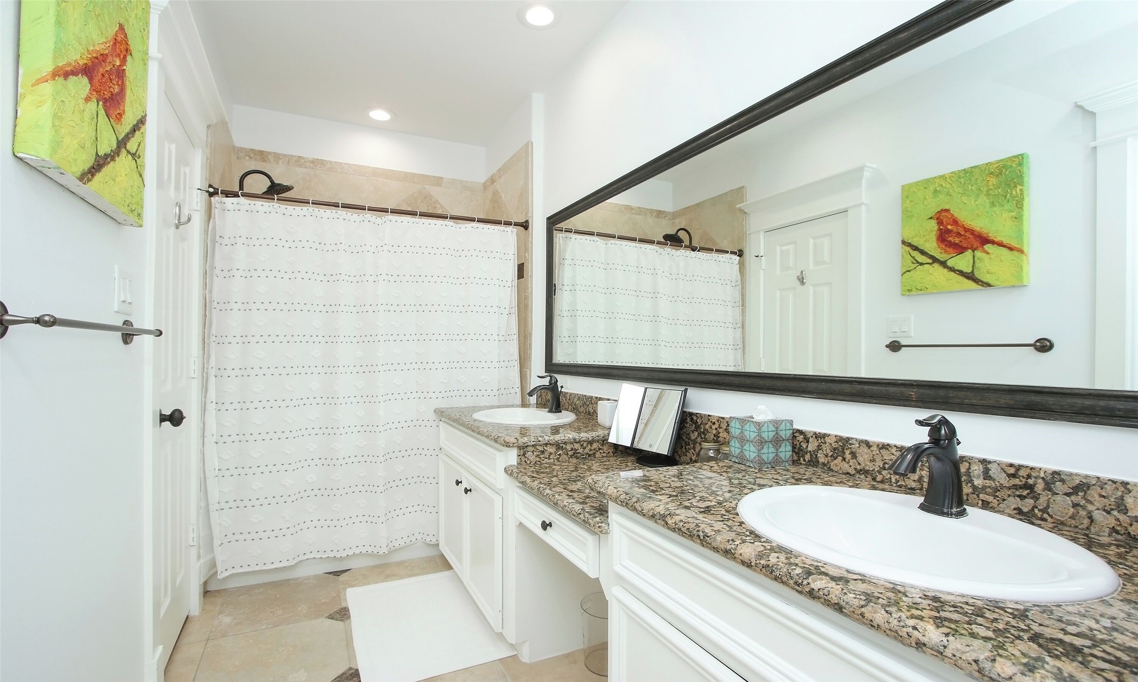 1330 West 25th Street, Unit C Houston, TX 77008 - Photo 25 of 30 a bathroom with a granite countertop sink mirror and a shower