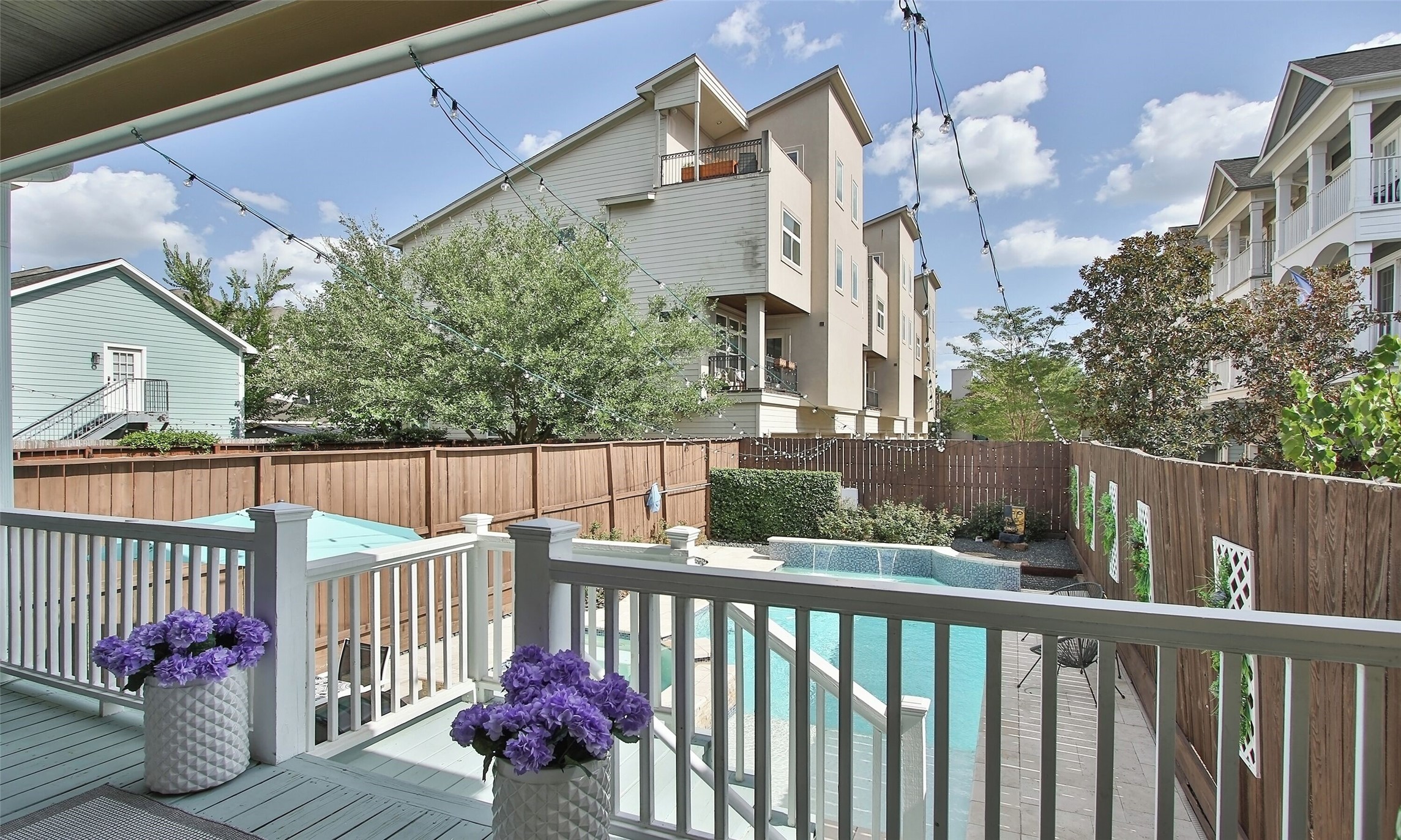 1330 West 25th Street, Unit C Houston, TX 77008 - Photo 26 of 30 a view of a balcony with wooden floor