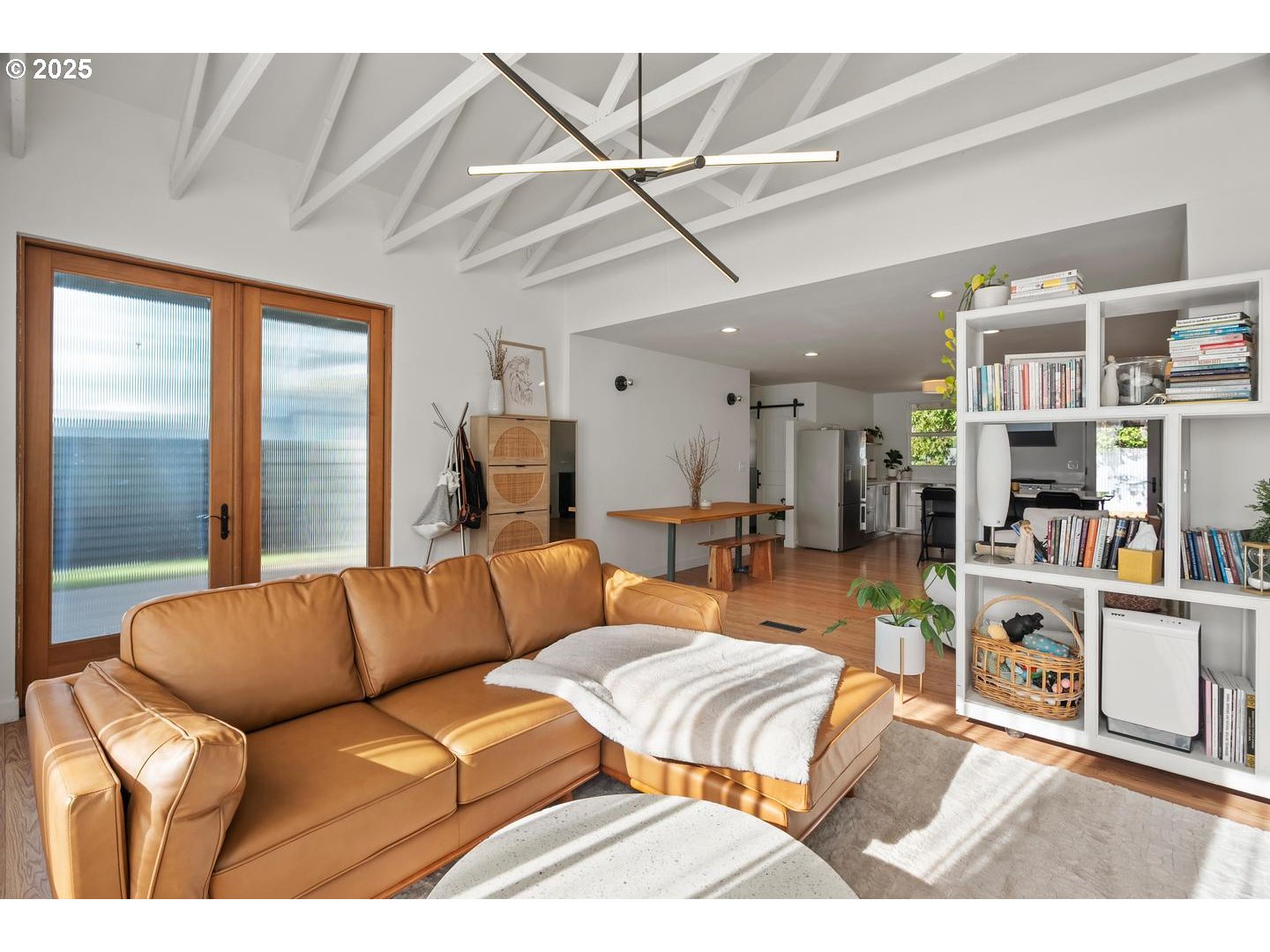 8629 Northeast Clackamas Street Portland, OR 97220 - Photo 9 of 32 a living room with furniture a large window and a rug