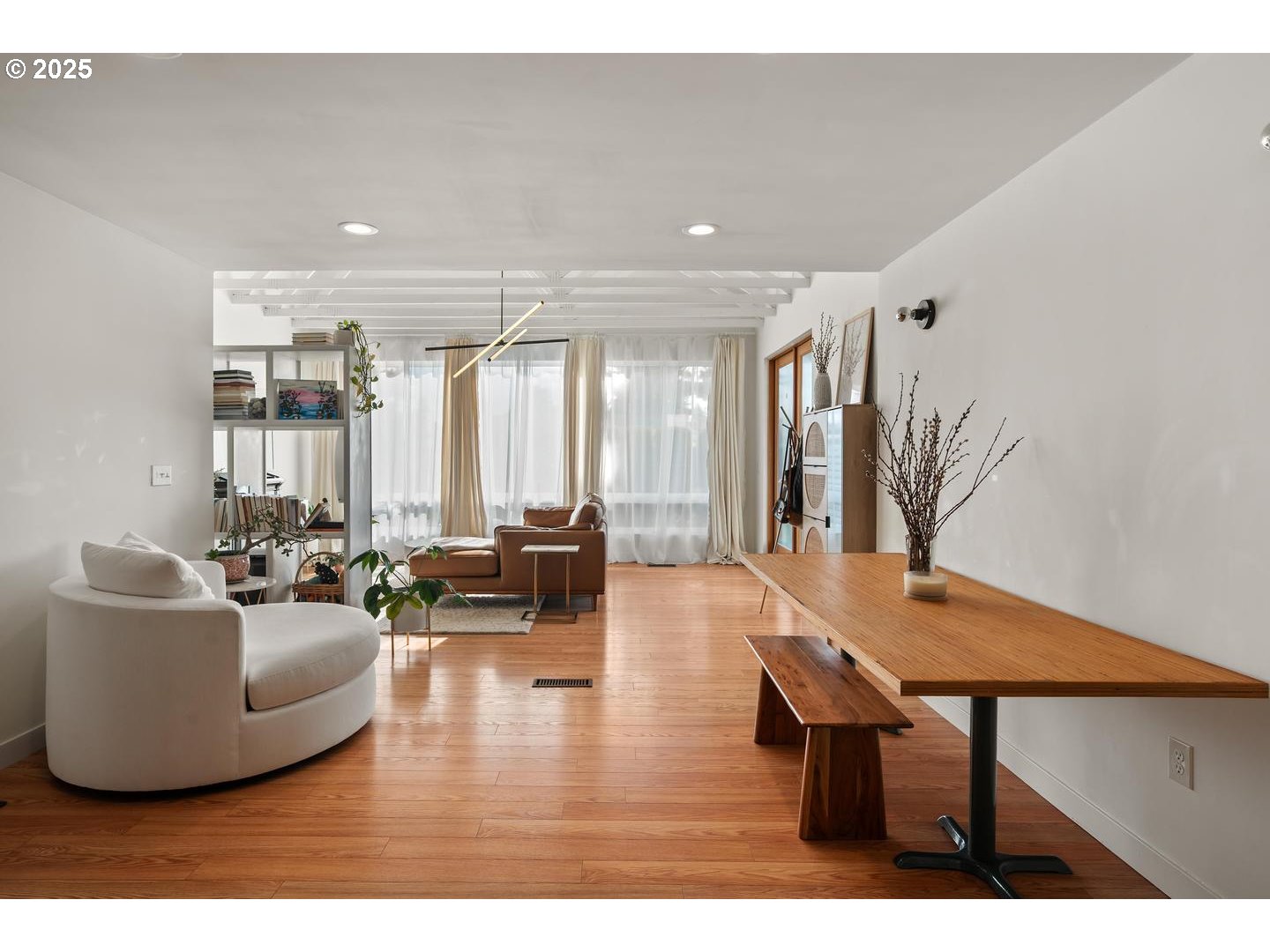 8629 Northeast Clackamas Street Portland, OR 97220 - Photo 10 of 32 a living room with furniture wooden floor and a table
