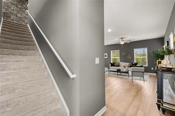 a kitchen with stainless steel appliances granite countertop a sink and cabinets