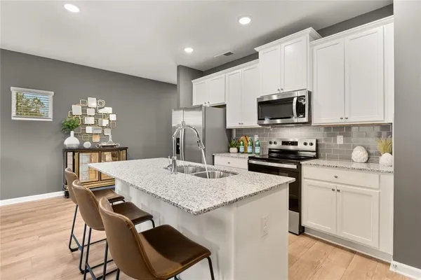 a living room with furniture and window