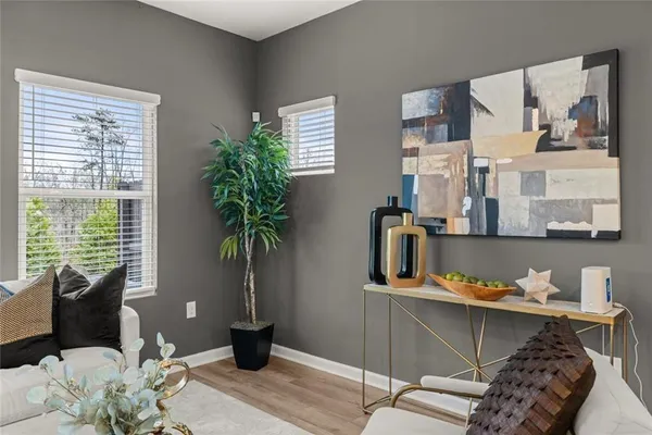 a living room with furniture and a window