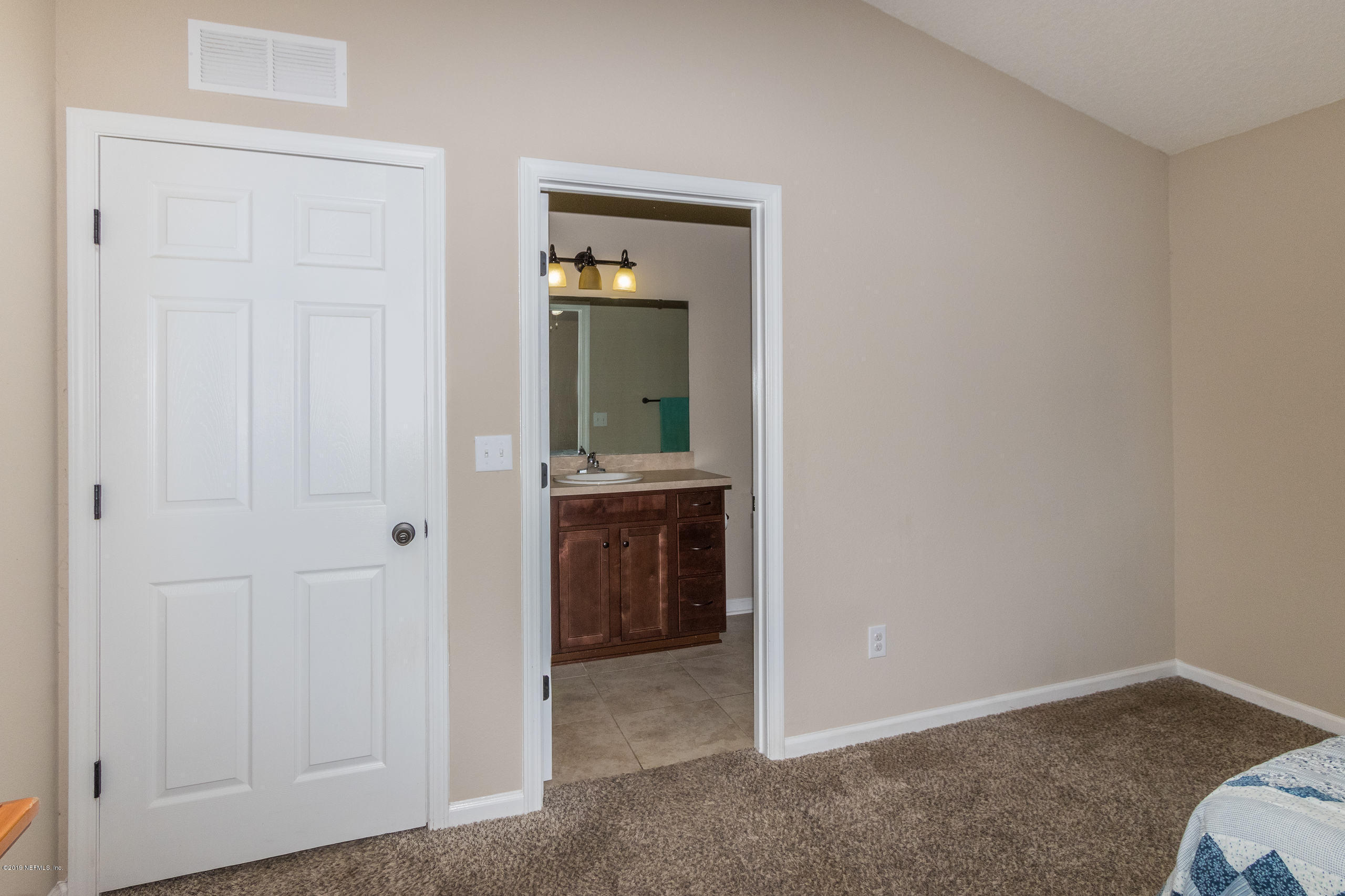 10413 Dobell Road Jacksonville, FL 32246 - Photo 22 of 24 master-bedroom
