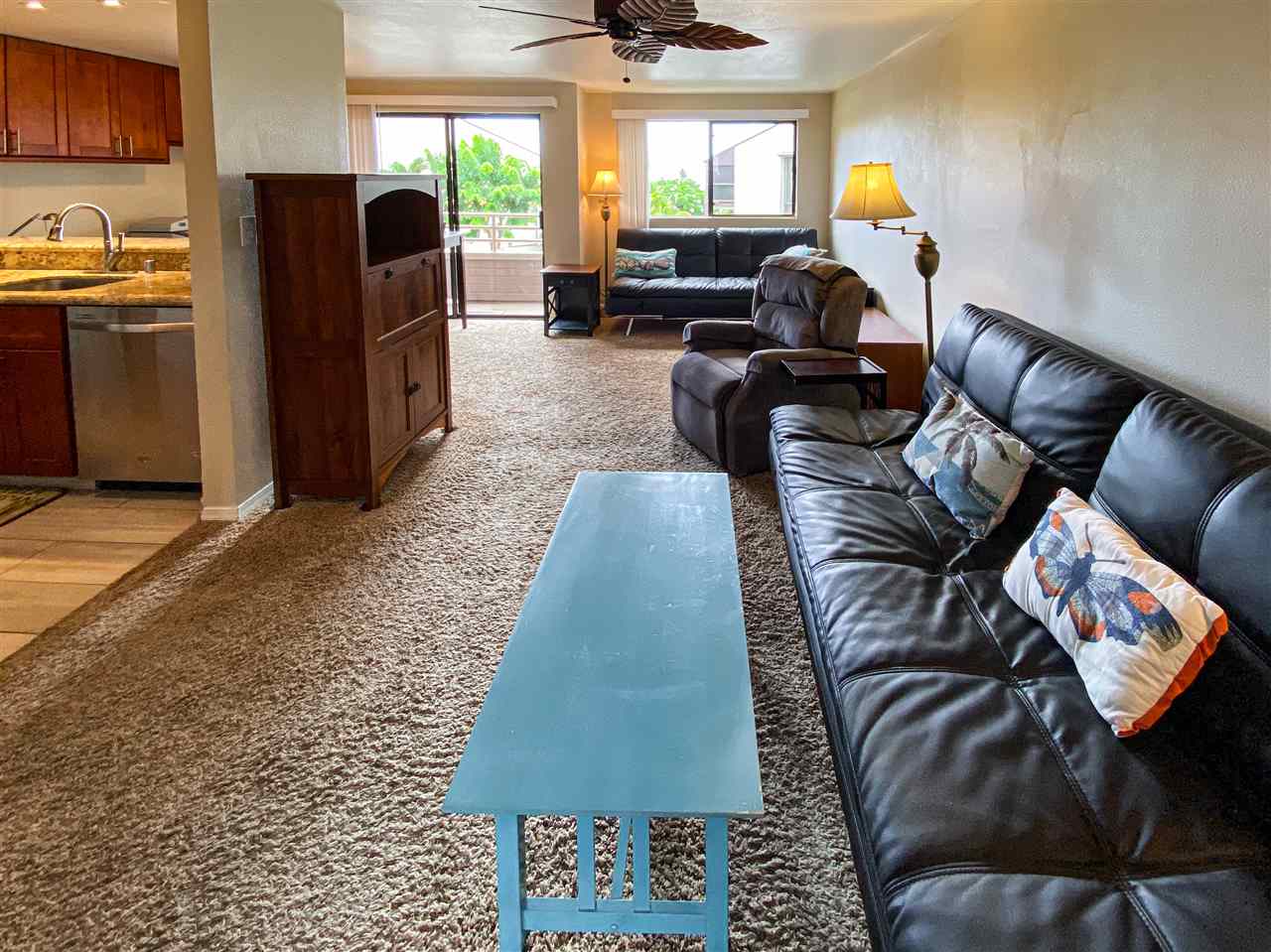 2747 South Kihei Road, Unit A201 Kihei, HI 96753 - Photo 14 of 29 a living room with furniture and a flat screen tv