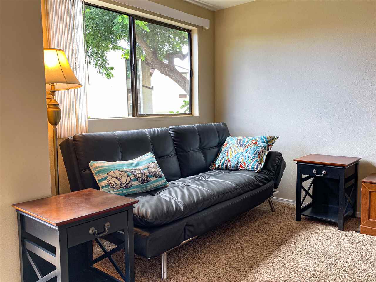 2747 South Kihei Road, Unit A201 Kihei, HI 96753 - Photo 16 of 29 a living room with furniture and a window