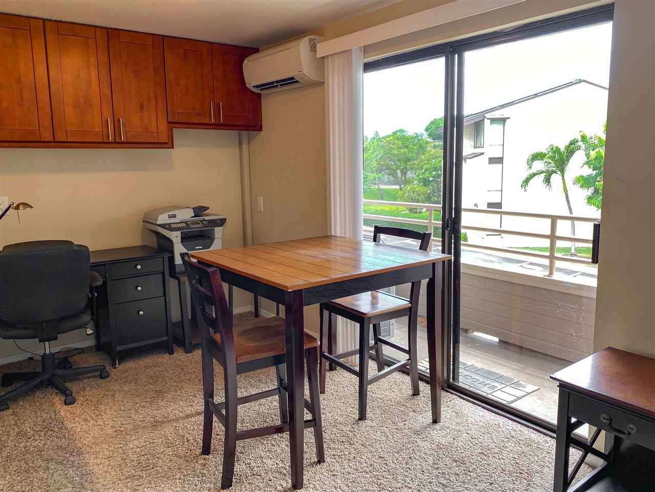 2747 South Kihei Road, Unit A201 Kihei, HI 96753 - Photo 17 of 29 a view of a workspace with furniture and a window