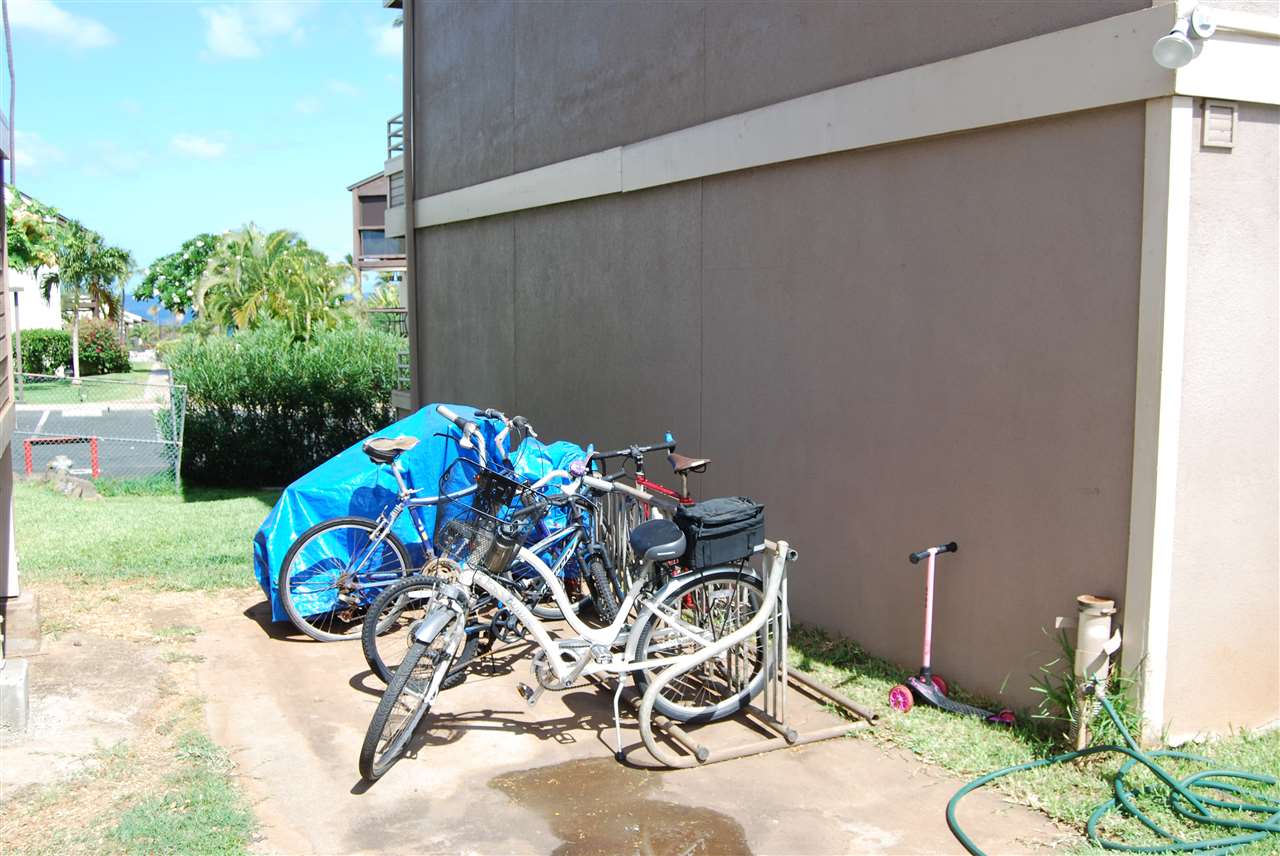 2747 South Kihei Road, Unit A201 Kihei, HI 96753 - Photo 26 of 29 a view of a chairs and table in backyard