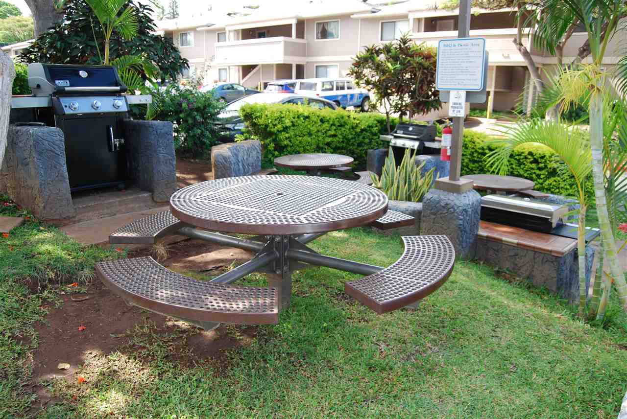 2747 South Kihei Road, Unit A201 Kihei, HI 96753 - Photo 28 of 29 a view of a backyard with plants and outdoor seating