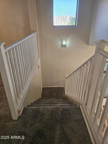 a view of a hallway to a house
