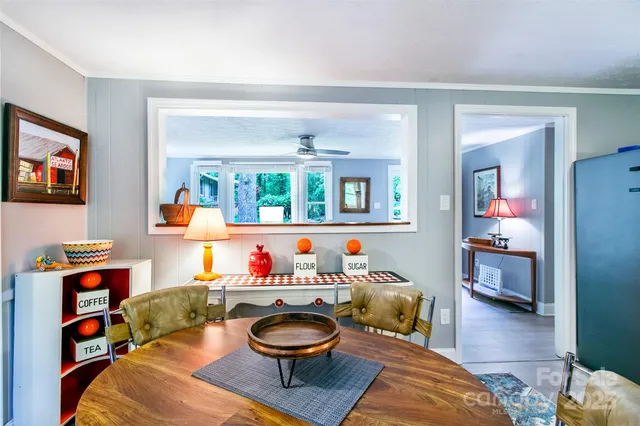 a bedroom with bed and window