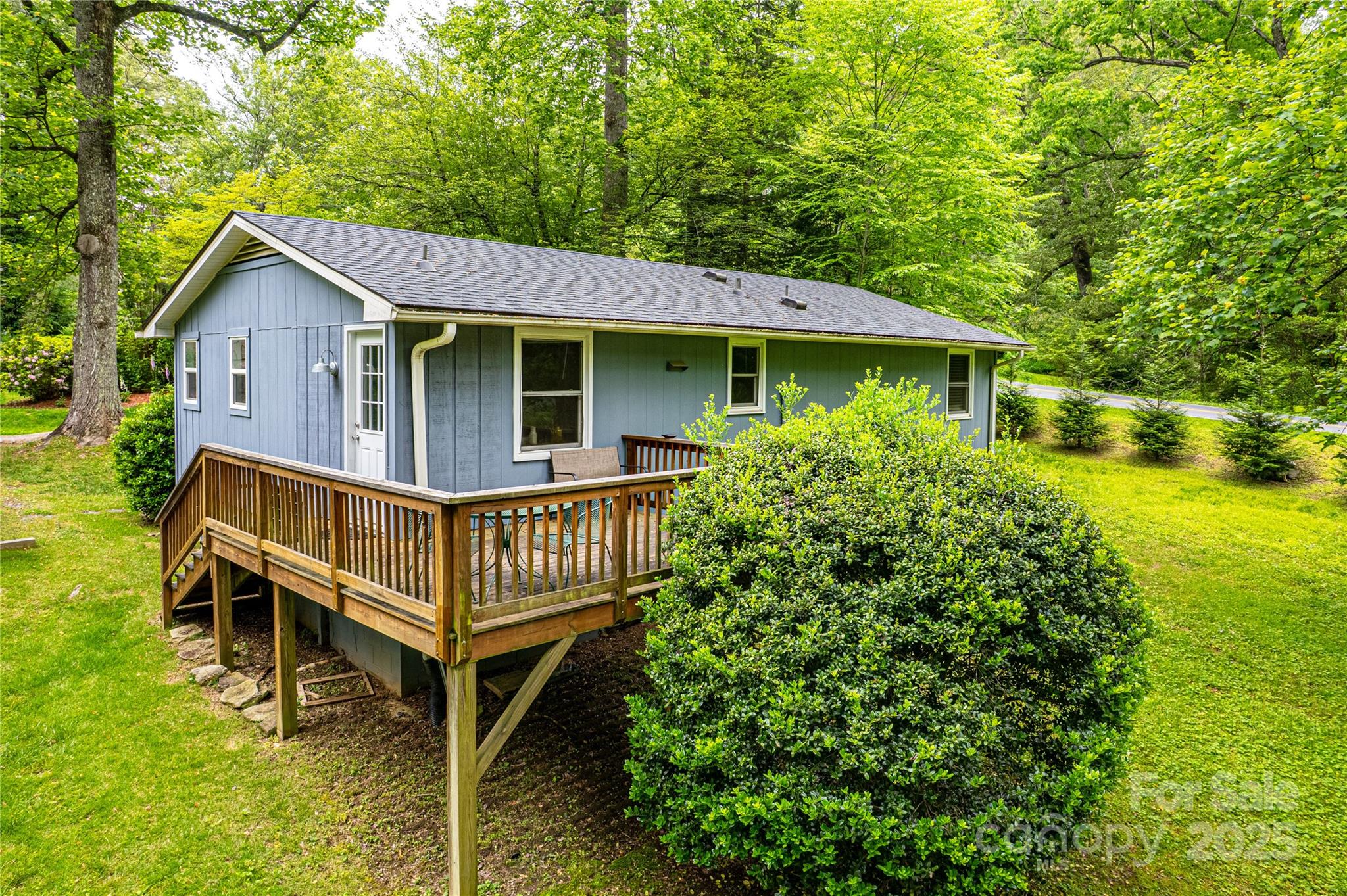15 Pope Road Brevard, NC 28712 - Photo 25 of 29 a view of a house with wooden deck front of house