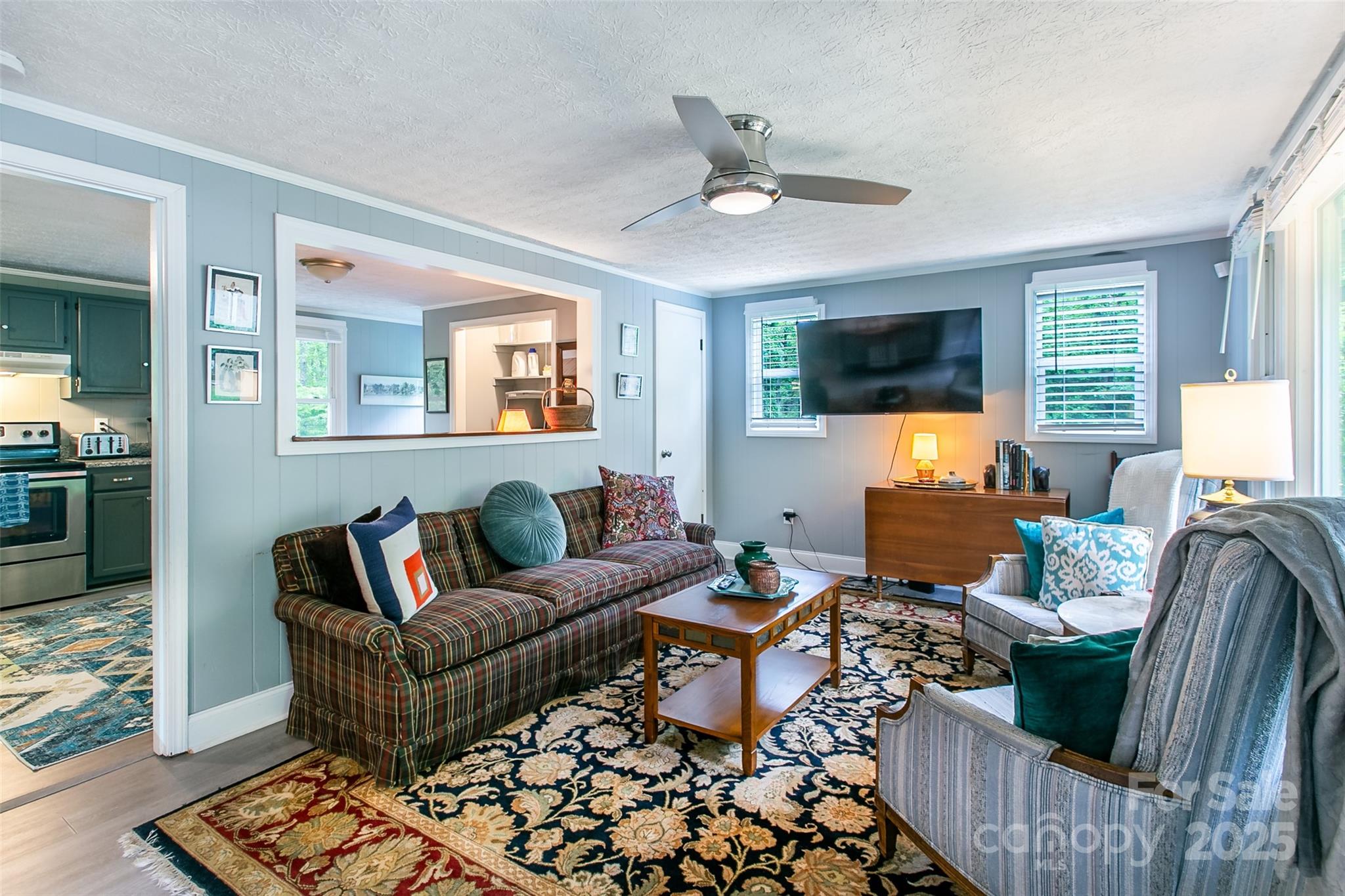 15 Pope Road Brevard, NC 28712 - Photo 4 of 29 a living room with furniture and a flat screen tv