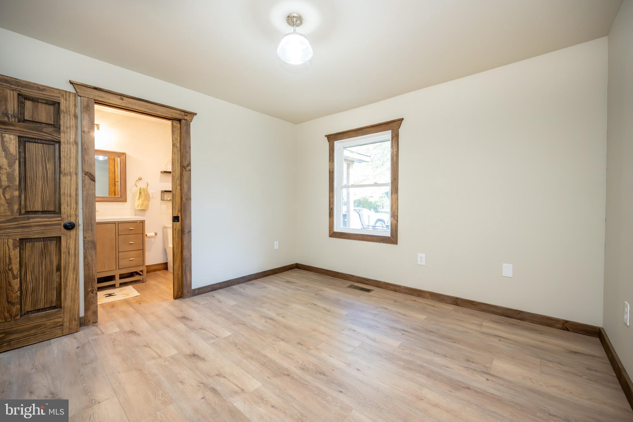 3456 Glendale Road Swanton, MD 21561 - Photo 56 of 93 an empty room with windows