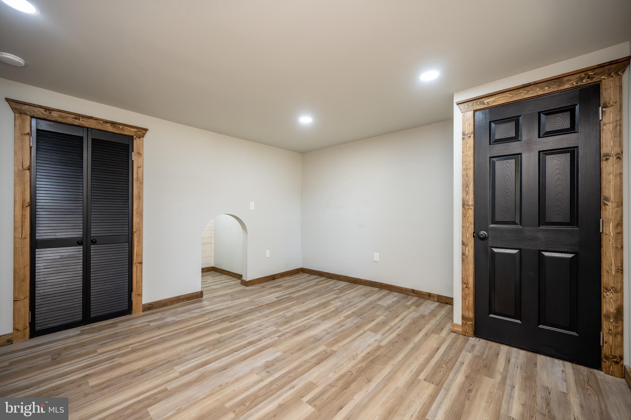 3456 Glendale Road Swanton, MD 21561 - Photo 74 of 93 a view of empty room with wooden floor