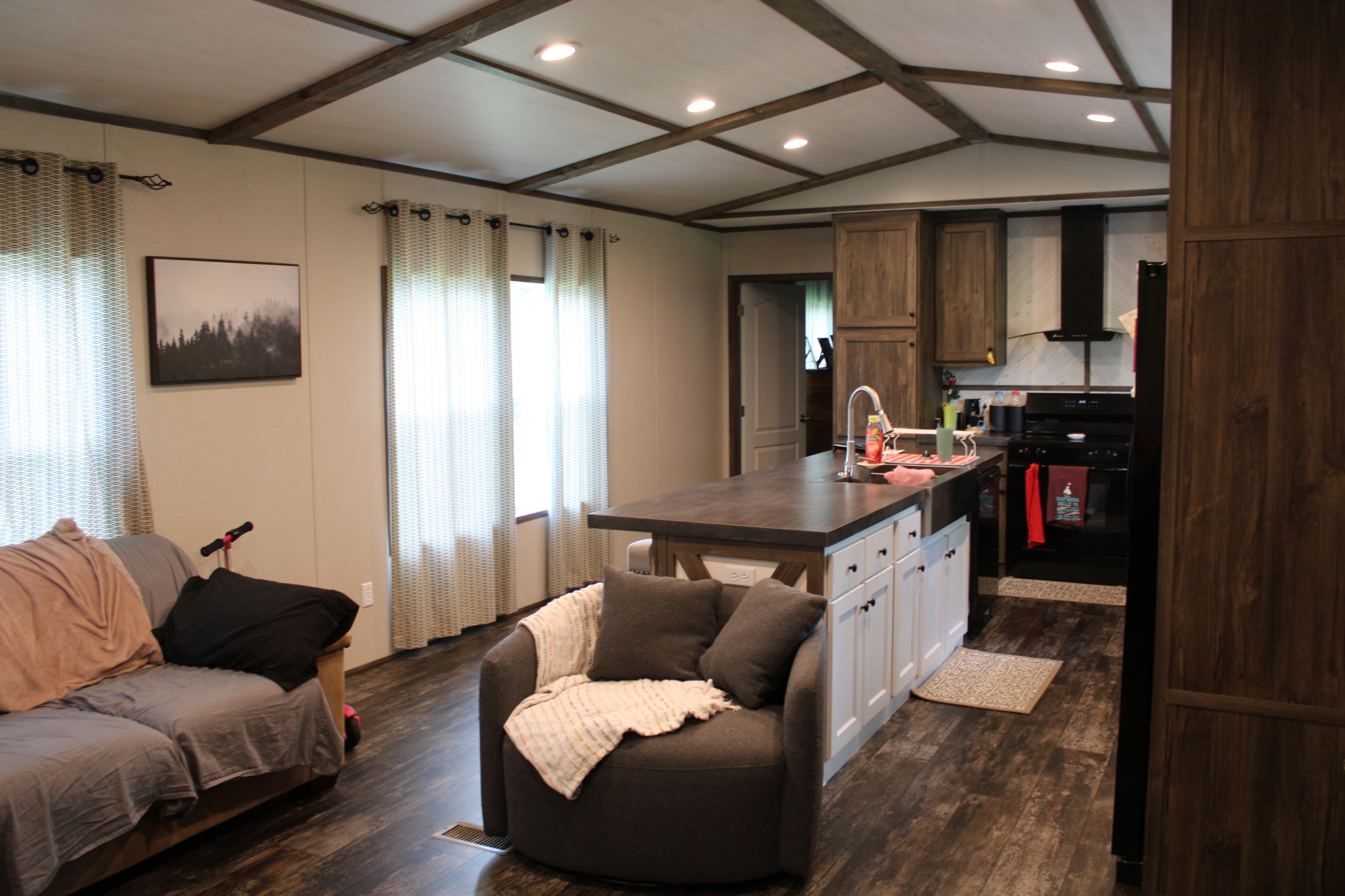 890 Oak Grove Road Goodspring, TN 38460 - Photo 3 of 18 a living room with furniture and a flat screen tv