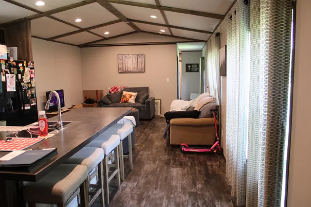 a view of a workspace with furniture