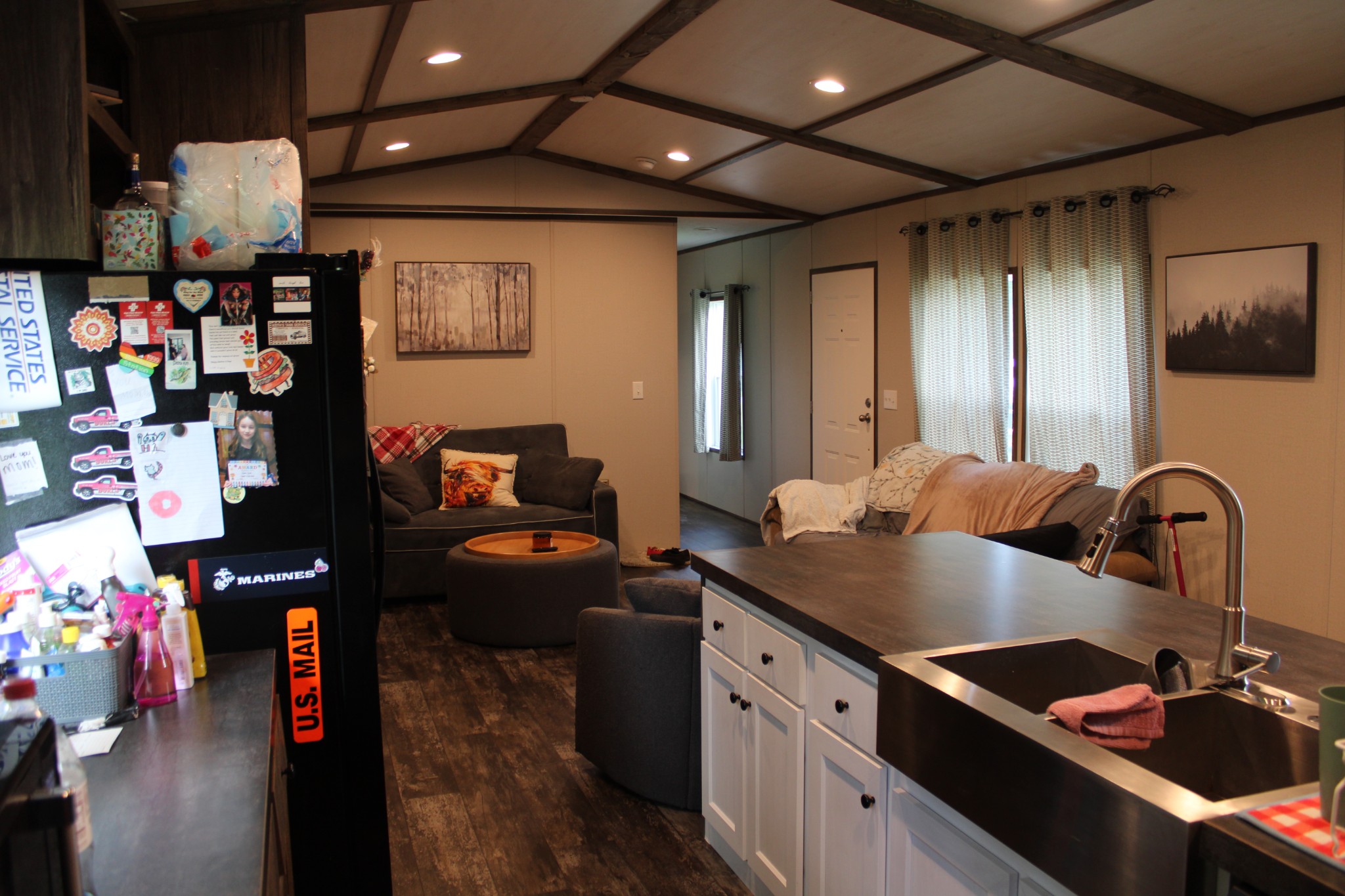890 Oak Grove Road Goodspring, TN 38460 - Photo 7 of 18 a kitchen with lots of clutter and stainless steel appliances