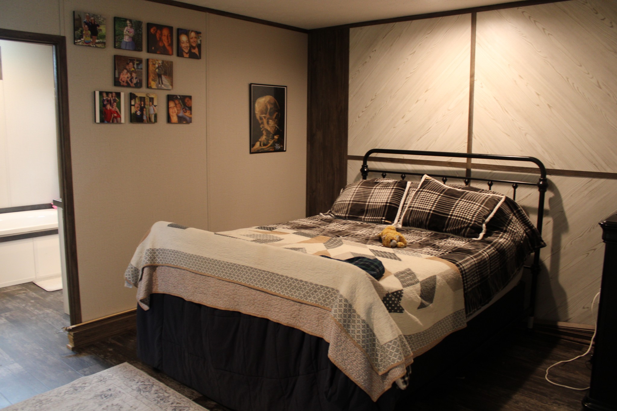 890 Oak Grove Road Goodspring, TN 38460 - Photo 8 of 18 a bedroom with a bed and painting on the wall