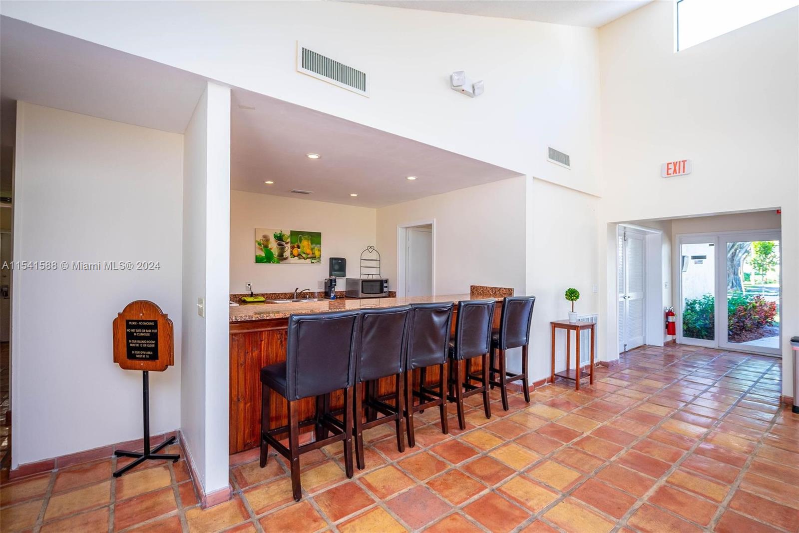7200 Northwest 2nd Avenue, Unit 1250 Boca Raton, FL 33487 - Photo 37 of 57 a view of a dining room with furniture
