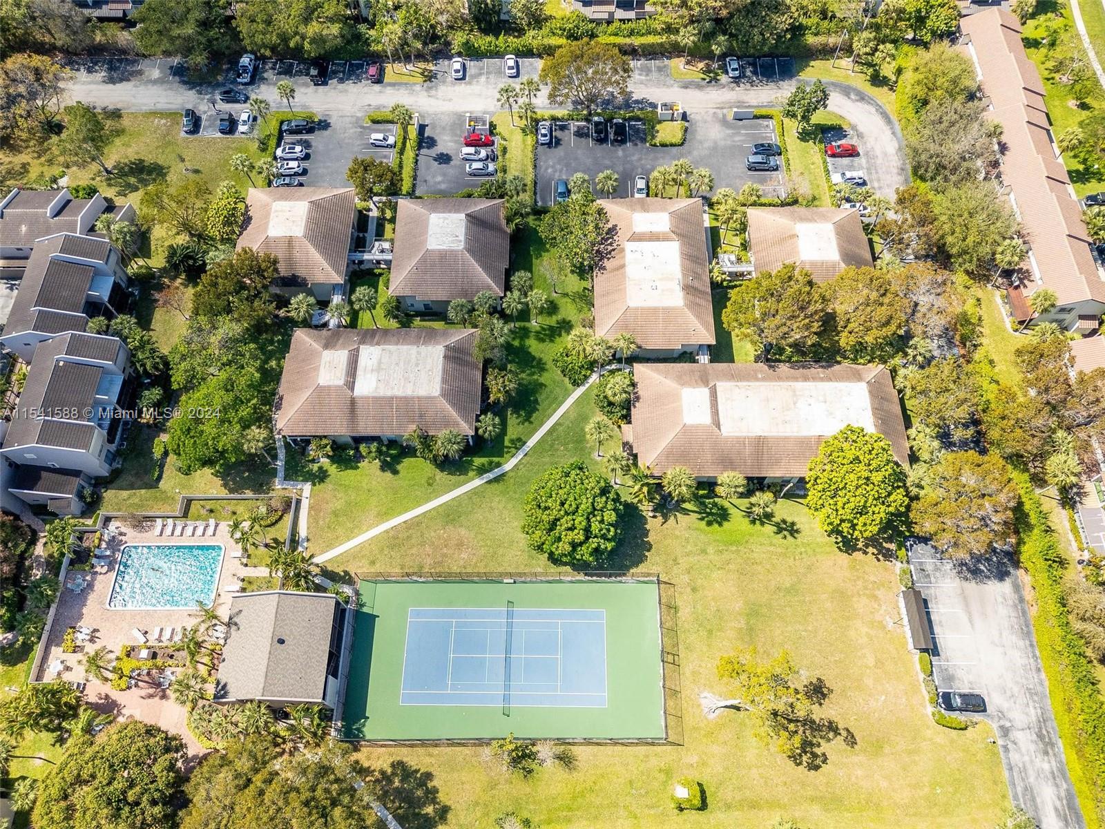 7200 Northwest 2nd Avenue, Unit 1250 Boca Raton, FL 33487 - Photo 54 of 57 an aerial view of residential houses with outdoor space