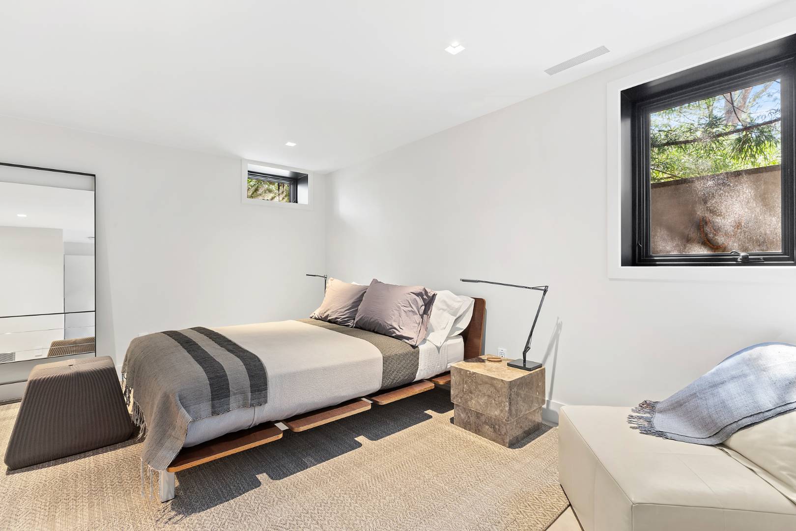 716 Hands Creek Road East Hampton, NY 11937 - Photo 17 of 24 a bedroom with a bed and window