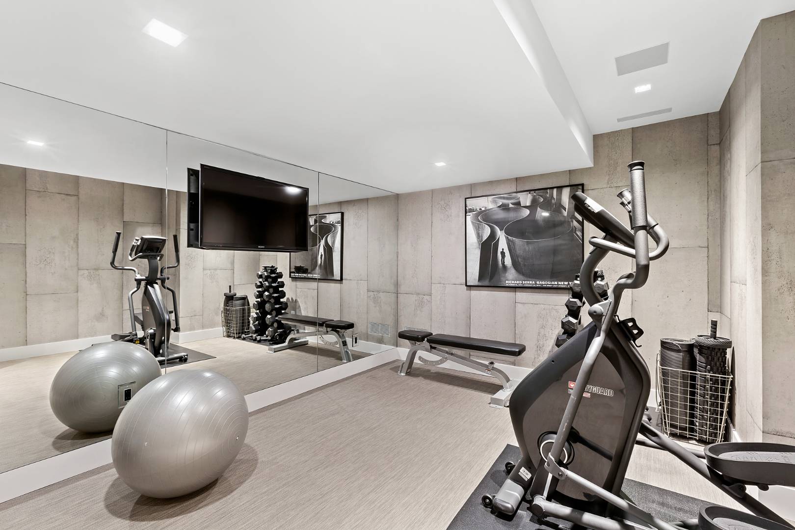 716 Hands Creek Road East Hampton, NY 11937 - Photo 18 of 24 a view of a room with gym equipment