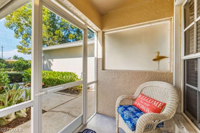 2876 West Crown Pointe Boulevard Naples, FL 34112 - Photo 19 of 36 View of front screened entry.