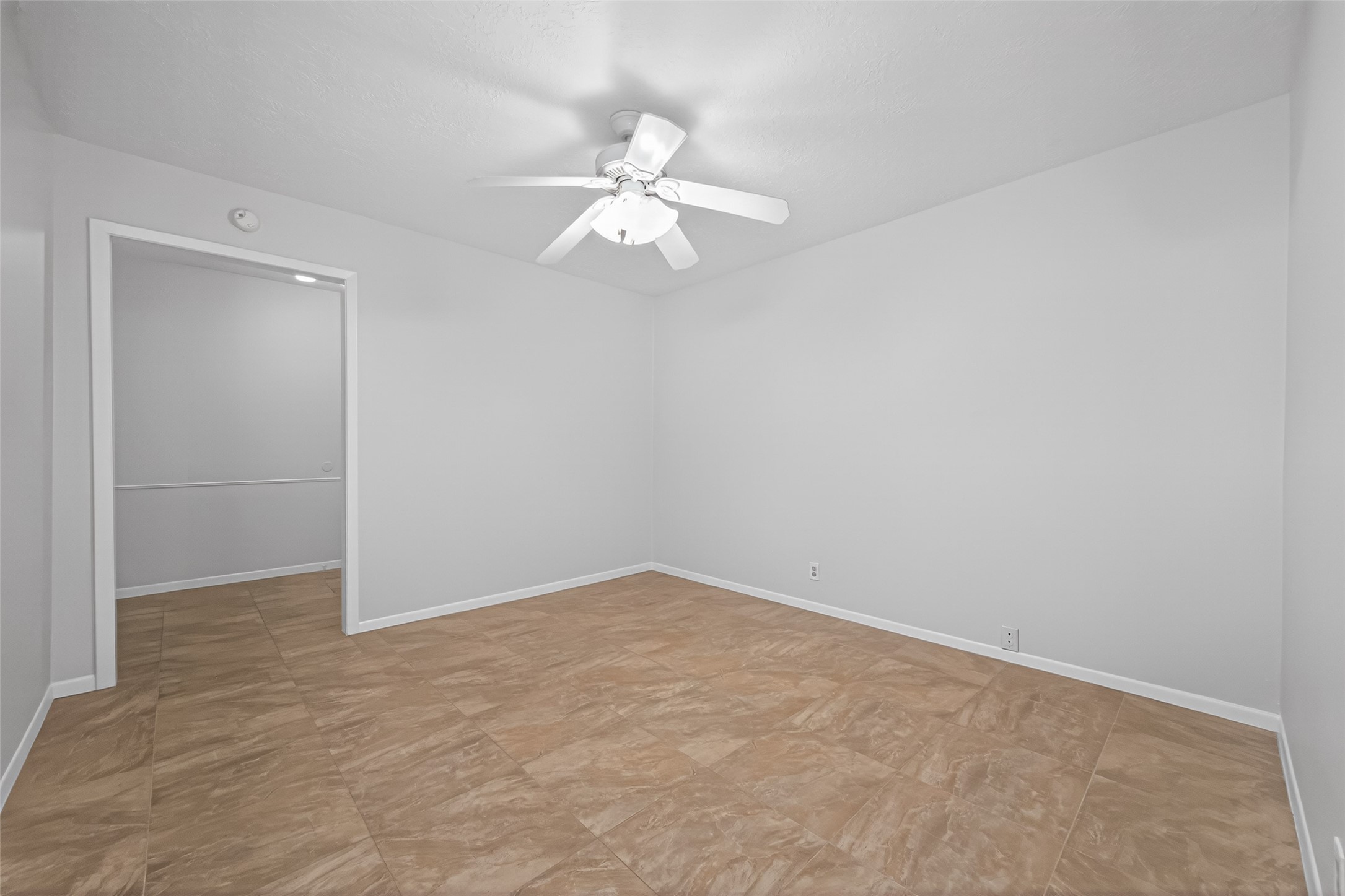 23919 Farm Hill Drive Spring, TX 77373 - Photo 22 of 41 an empty room with a fan and a fan