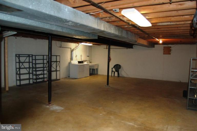 18809 Willow Grove Road Olney, MD 20832 - Photo 13 of 15 a view of empty room with windows