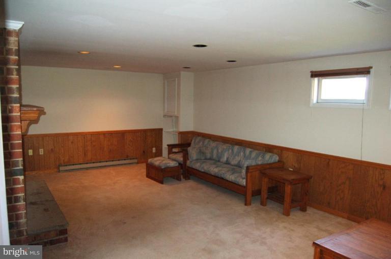 18809 Willow Grove Road Olney, MD 20832 - Photo 7 of 15 a living room with furniture