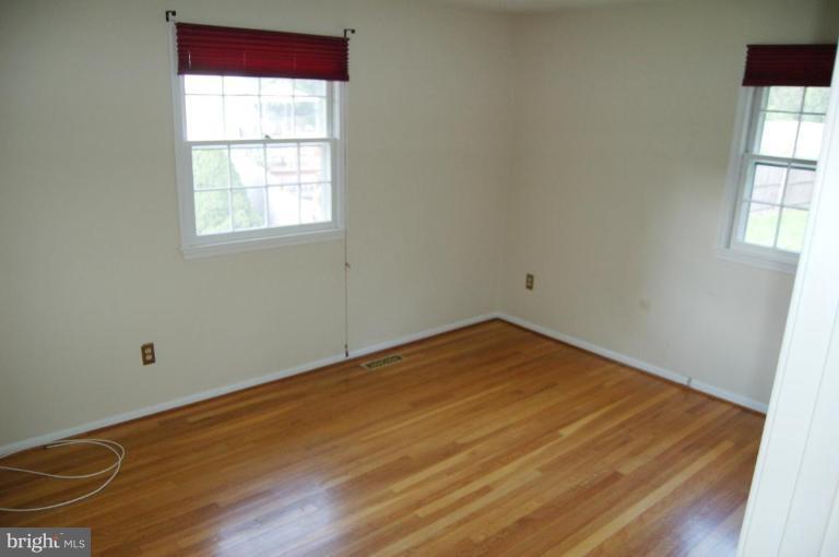 18809 Willow Grove Road Olney, MD 20832 - Photo 8 of 15 an empty room with a window