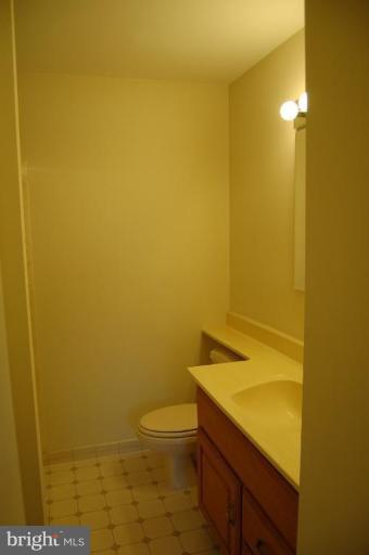 18809 Willow Grove Road Olney, MD 20832 - Photo 9 of 15 a bathroom with a sink and a toilet