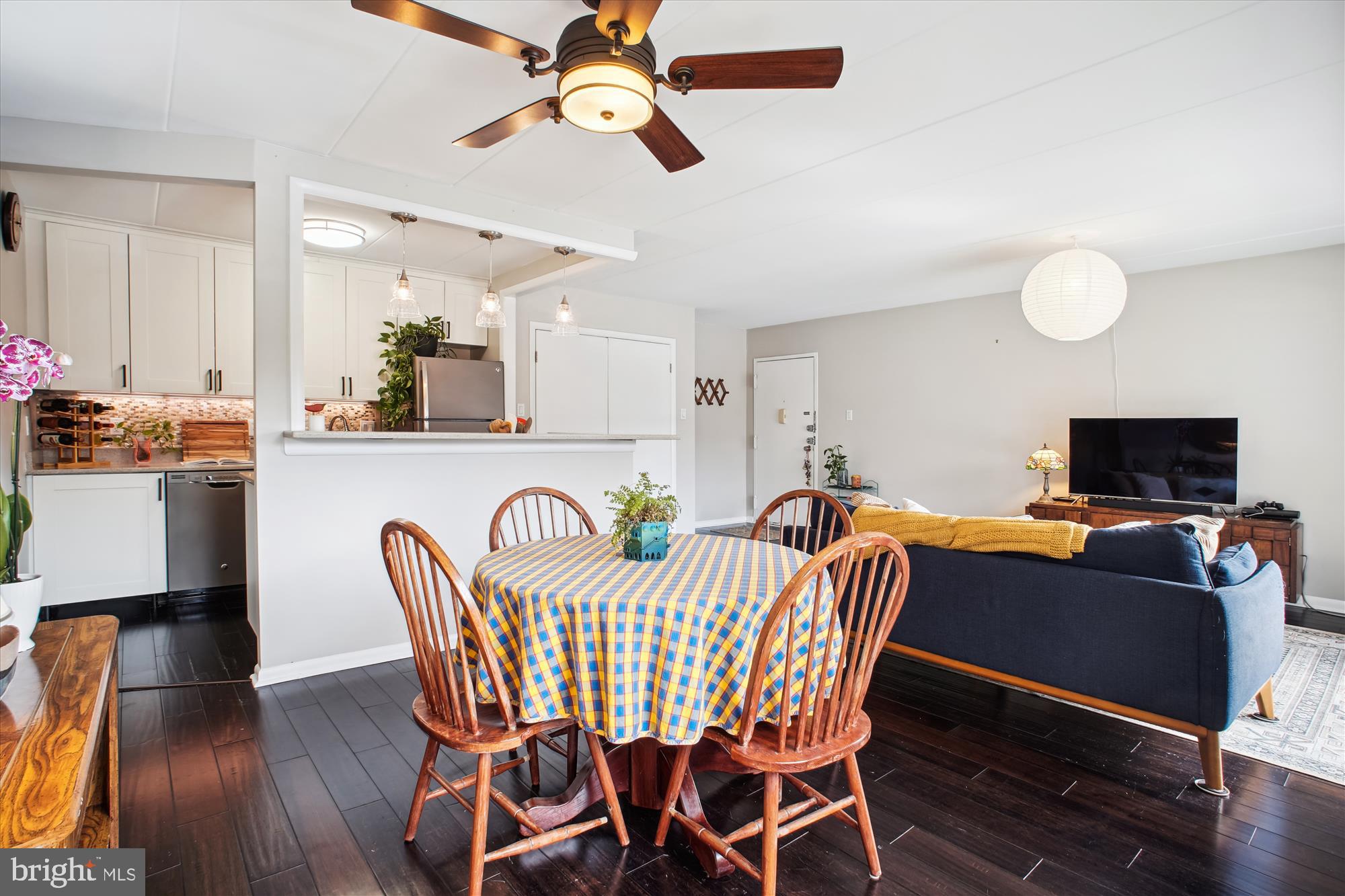 6220 Edsall Road, Unit 301 Alexandria, VA 22312 - Photo 8 of 21 a view of a dining room with furniture and wooden floor