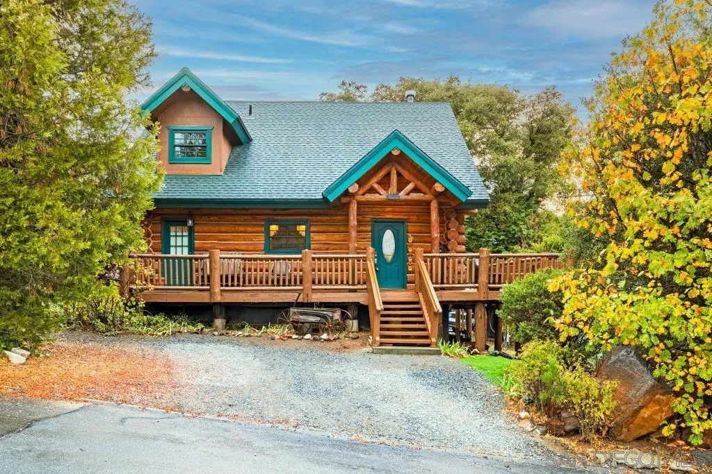 15469 Incapa Road Julian, CA 92036 - Photo 20 of 23 a front view of a house with a yard and garage