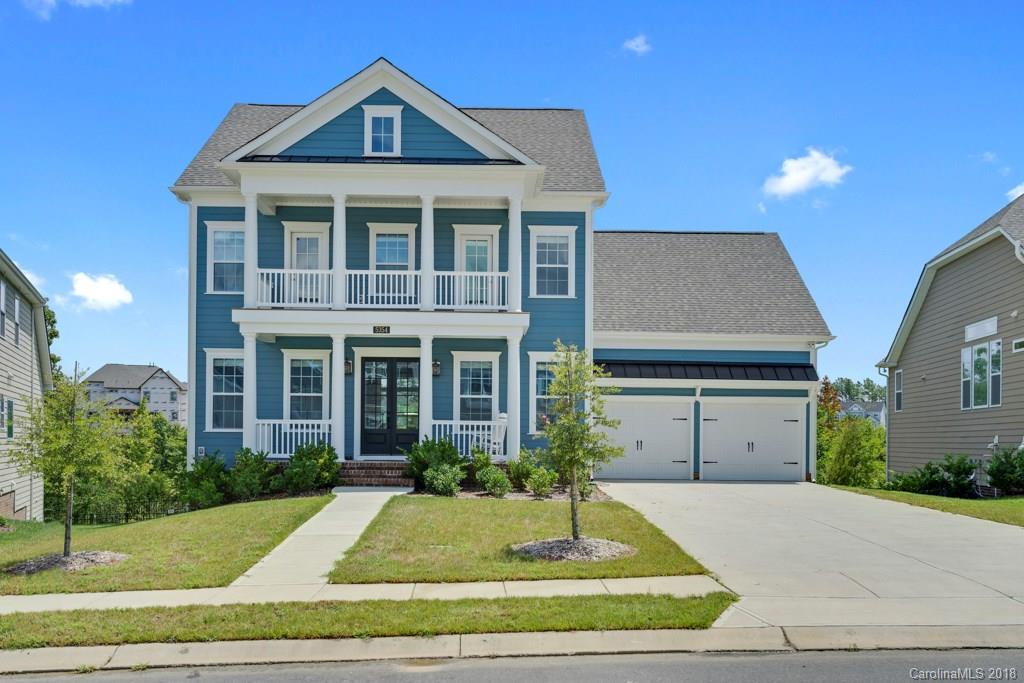 5354 Meadowcroft Way, Unit 56 Fort Mill, SC 29708 - Photo 1 of 36 a front view of a house with garden